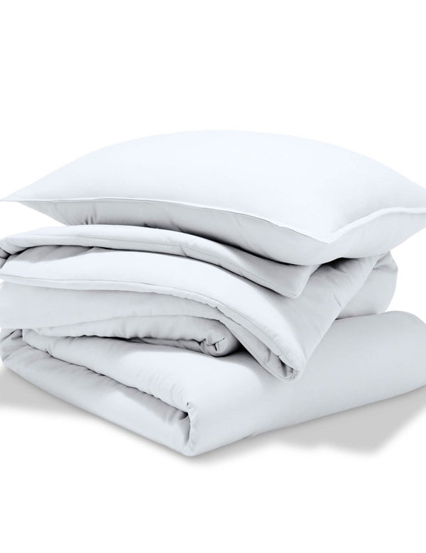 A comforter set folded and stacked