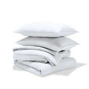 A comforter set folded and stacked