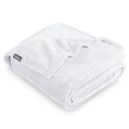 Textured blanket with a Bare Home label on a white background