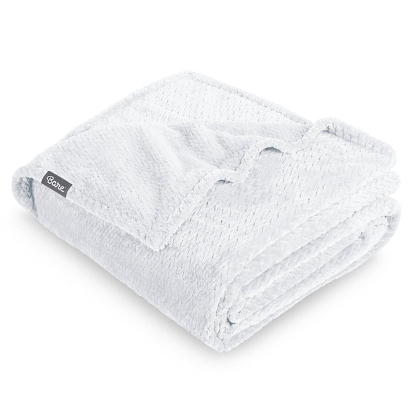 Textured blanket with a Bare Home label on a white background