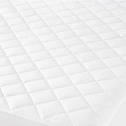 Close up of a quilted mattress pad