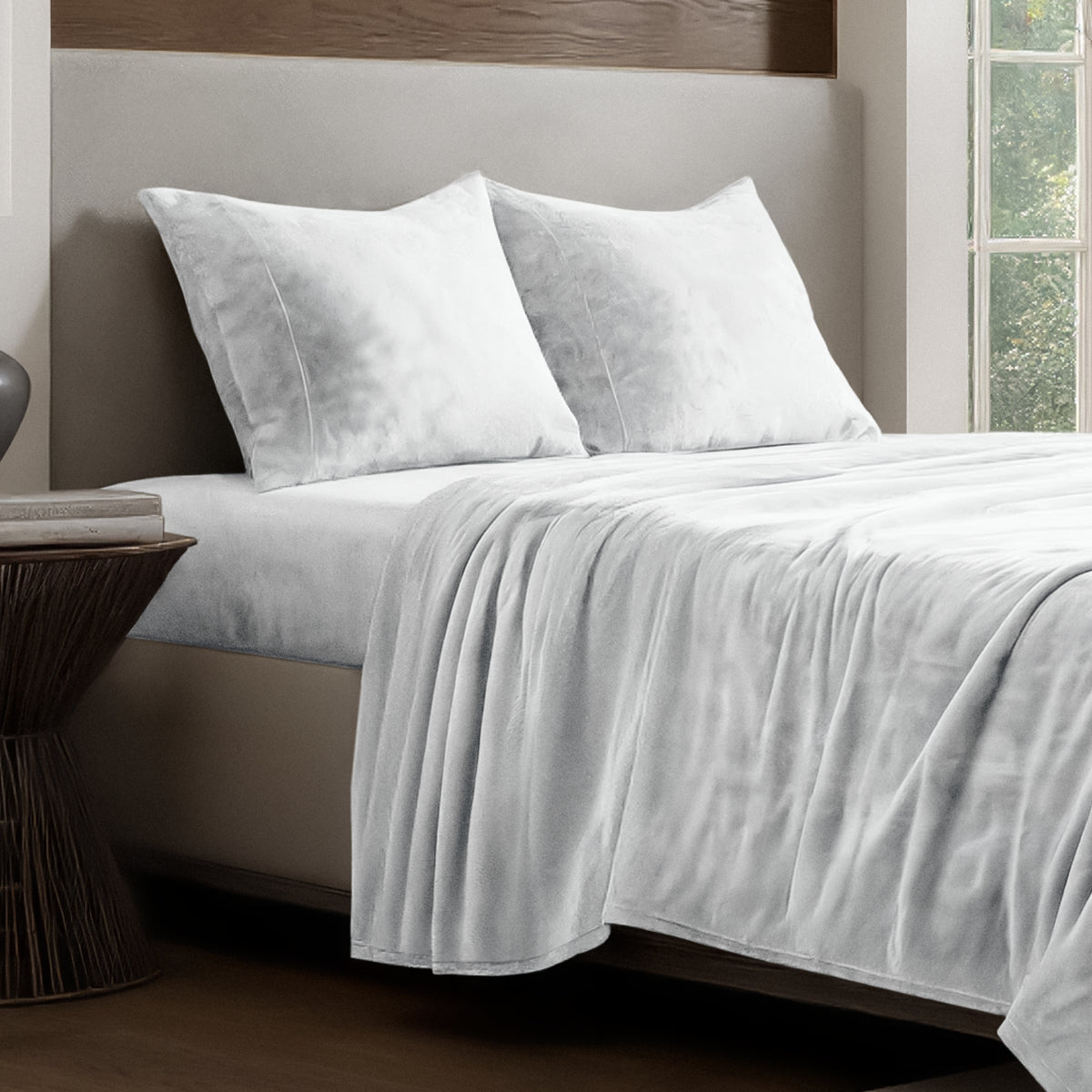 Microplush sheet set on a bed.