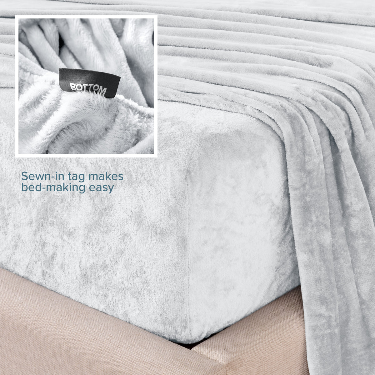 Close-up of the corner of a bed made with microplush sheets