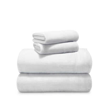 Stack of microplush sheets on a white background