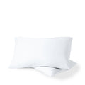 Two pillows with percale pillowcases on them
