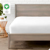 Modern wood bed frame with a sateen fitted sheet on the mattress