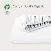 Certified GOTS Organic fitted sheet on a light gray background