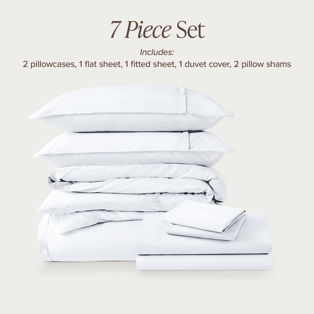 7-piece percale bedding set with pillowcases, flat sheet, fitted sheet, duvet cover, and pillow shams on a light background.