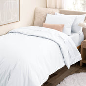 College dorm room with percale bedding