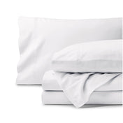Organic flannel bed sheets and pillowcase set on a white background