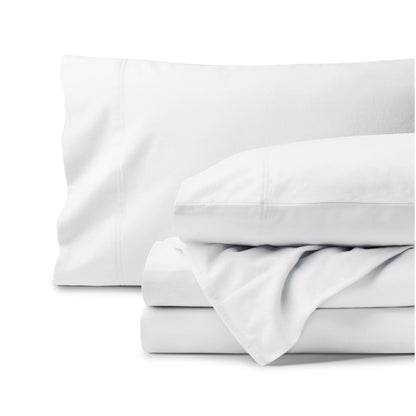 Organic flannel bed sheets and pillowcase set on a white background