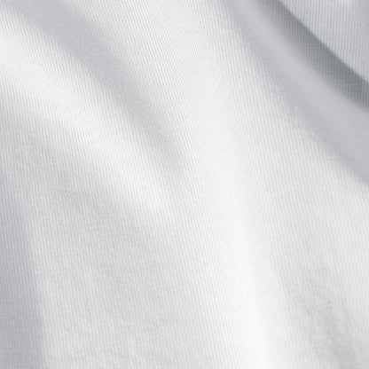 Close-up of organic cotton jersey fabric with subtle texture
