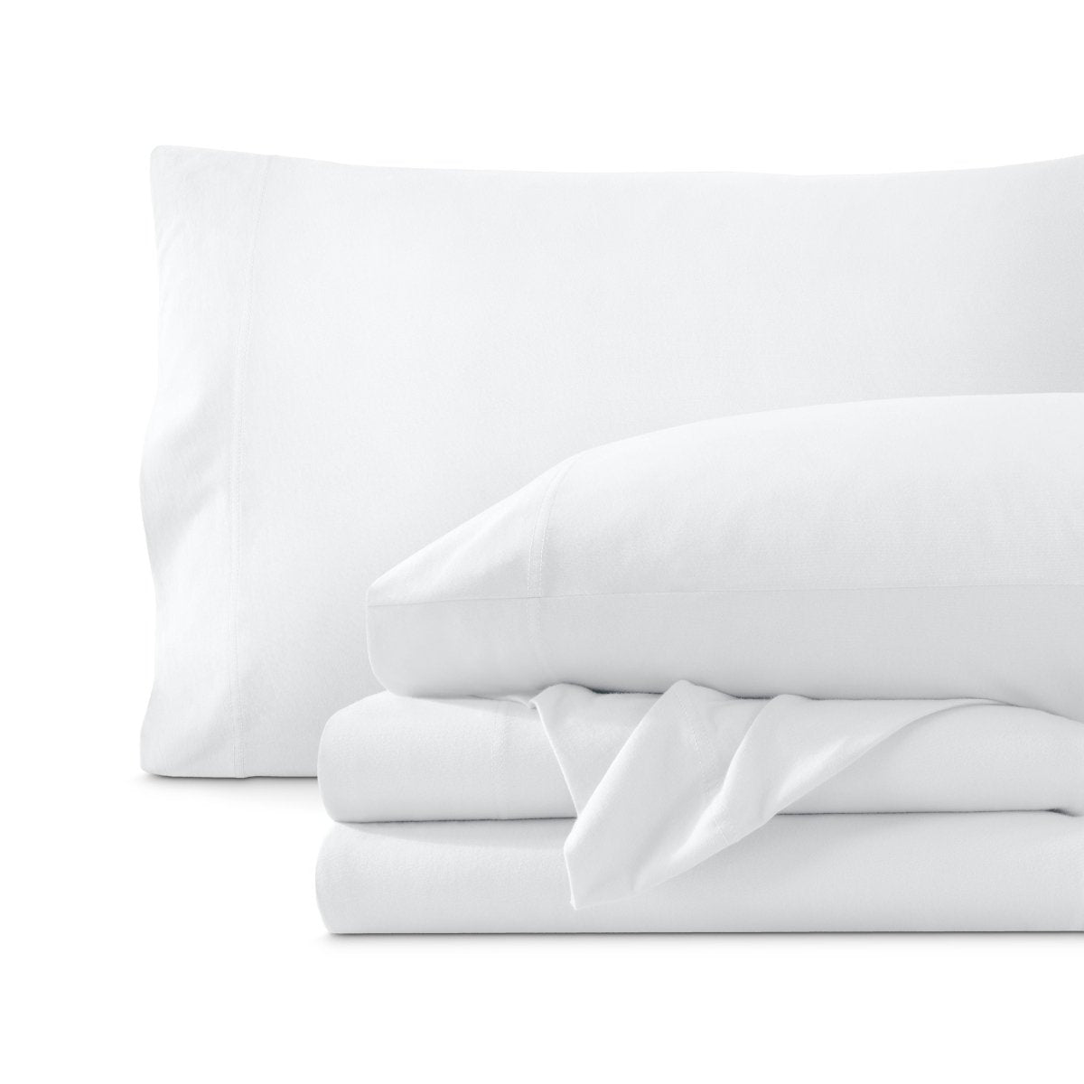 Set of organic cotton jersey sheets on a white background