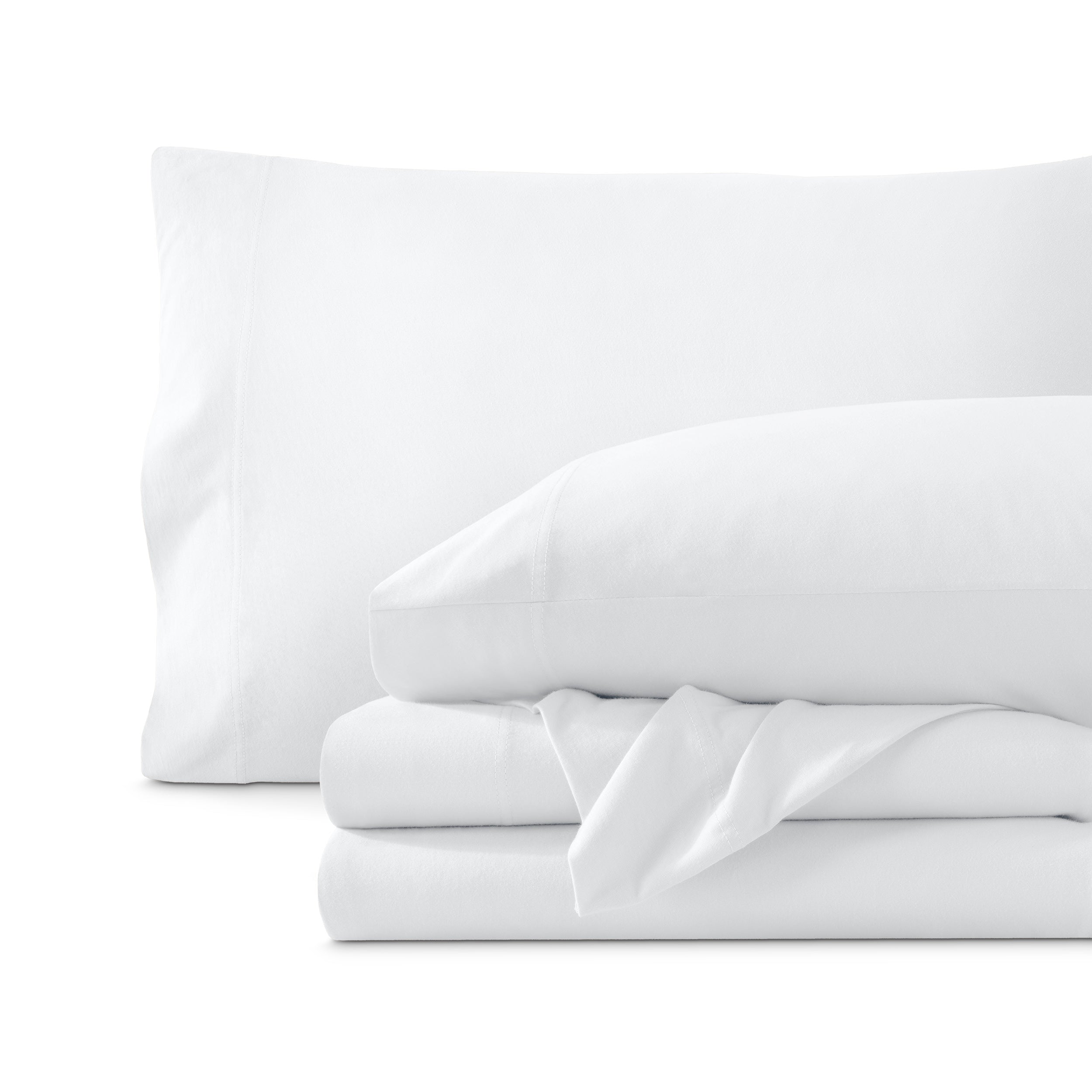 Set of organic cotton jersey sheets on a white background