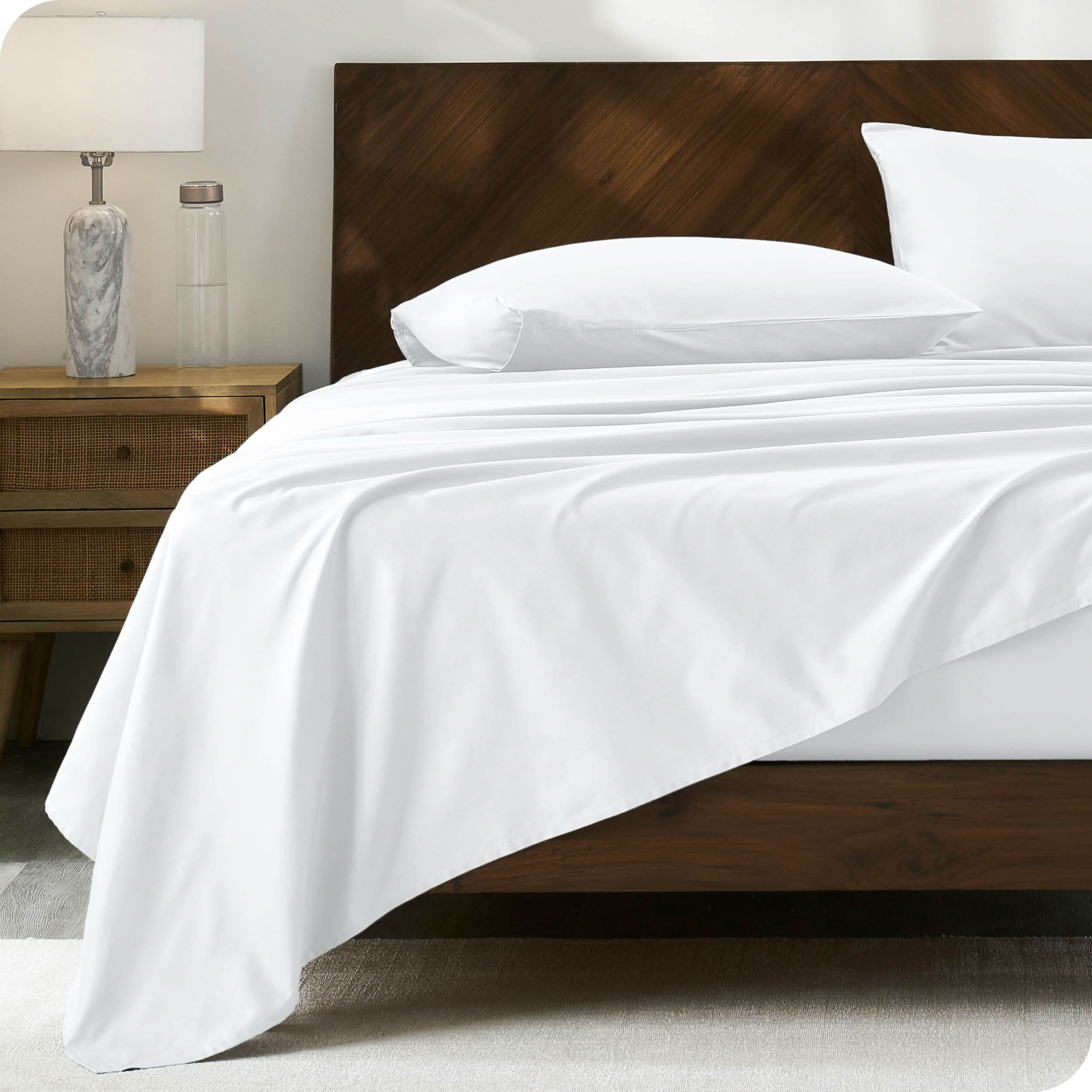 Modern wood bed made with percale sheet set