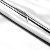Close-up of a zipper closure on the satin pillowcase