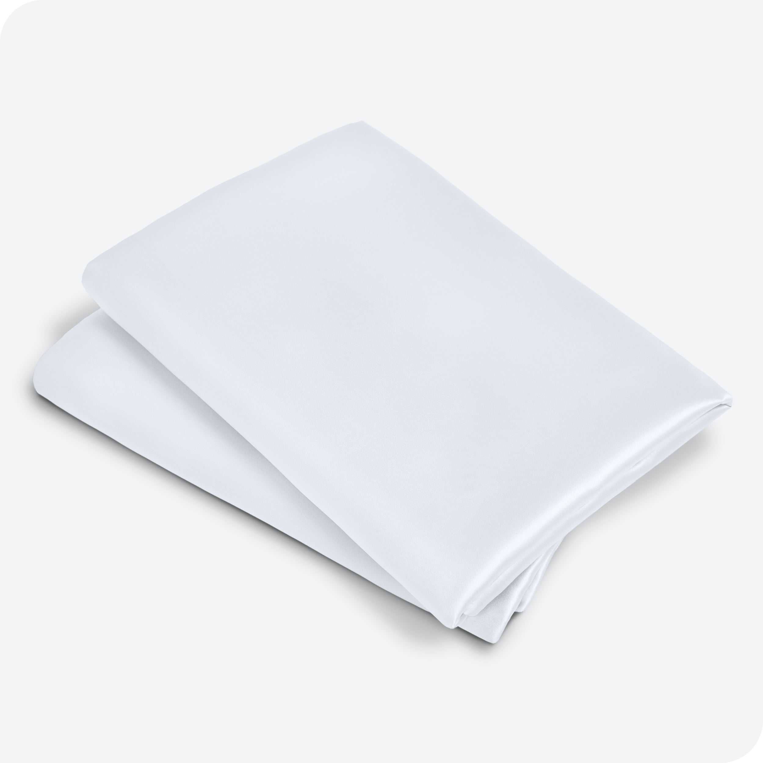 Two satin pillowcases folded and stacked