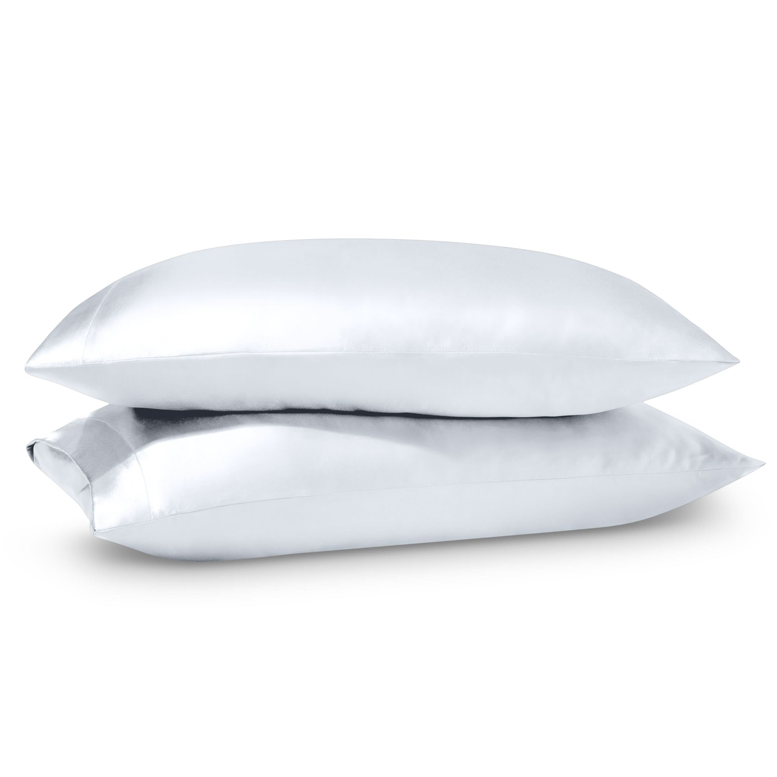 2 satin pillowcases on pillows stacked