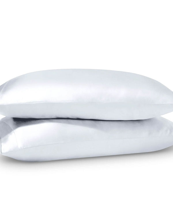 2 satin pillowcases on pillows stacked