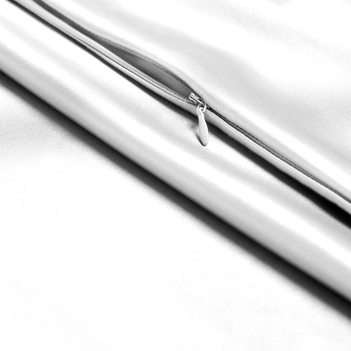 Close-up of poly satin pillowcase with a zipper