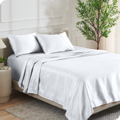 Satin sheets on a bed
