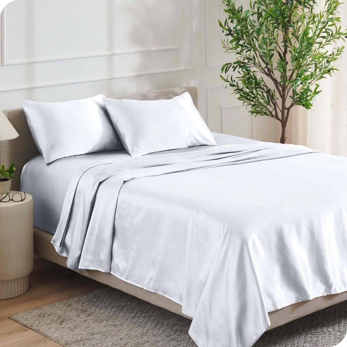 Satin sheets on a bed