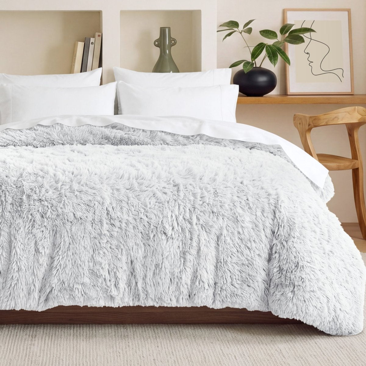 Shaggy duvet on a bed in a bedroom setting with decor elements.