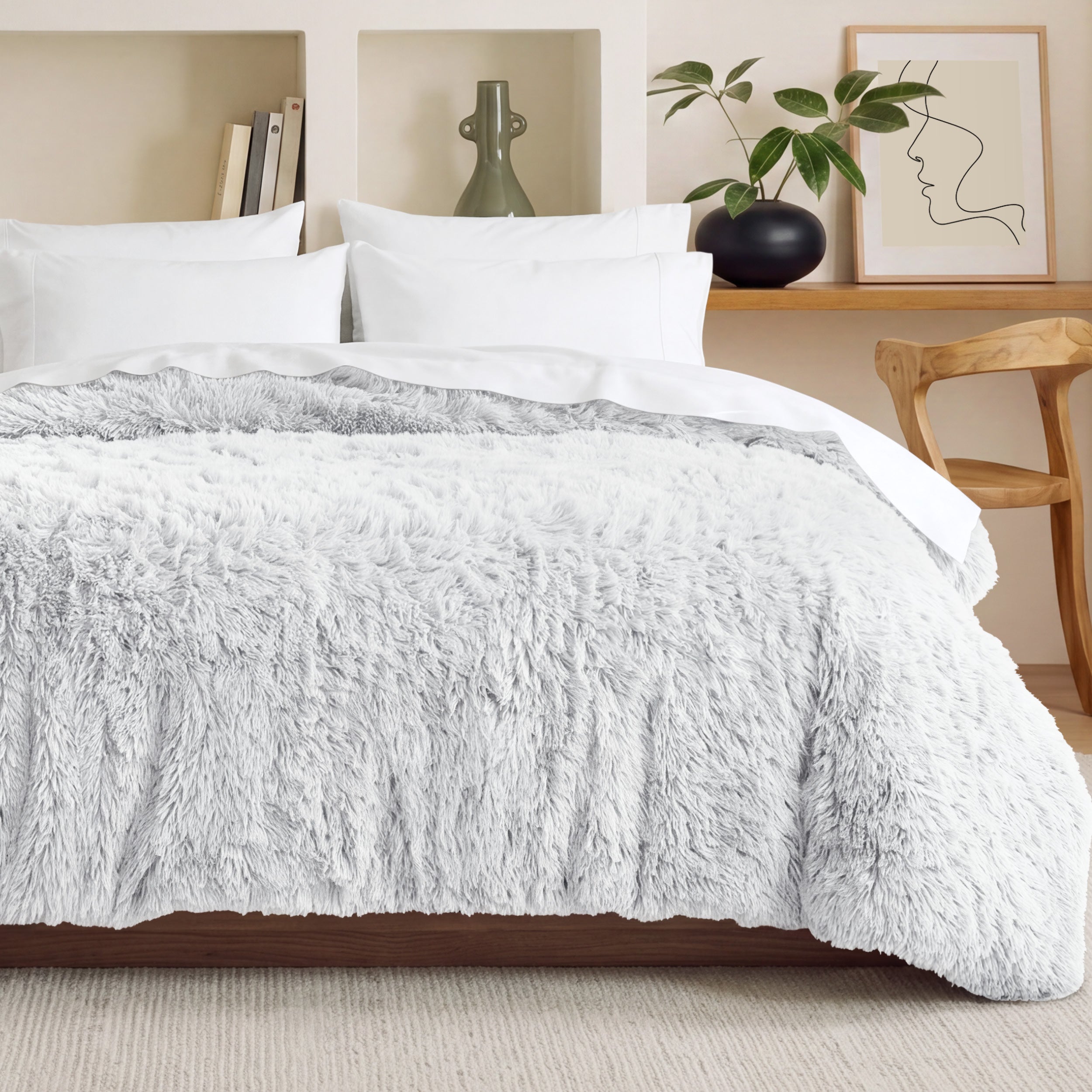 Shaggy duvet on a bed in a bedroom setting with decor elements.