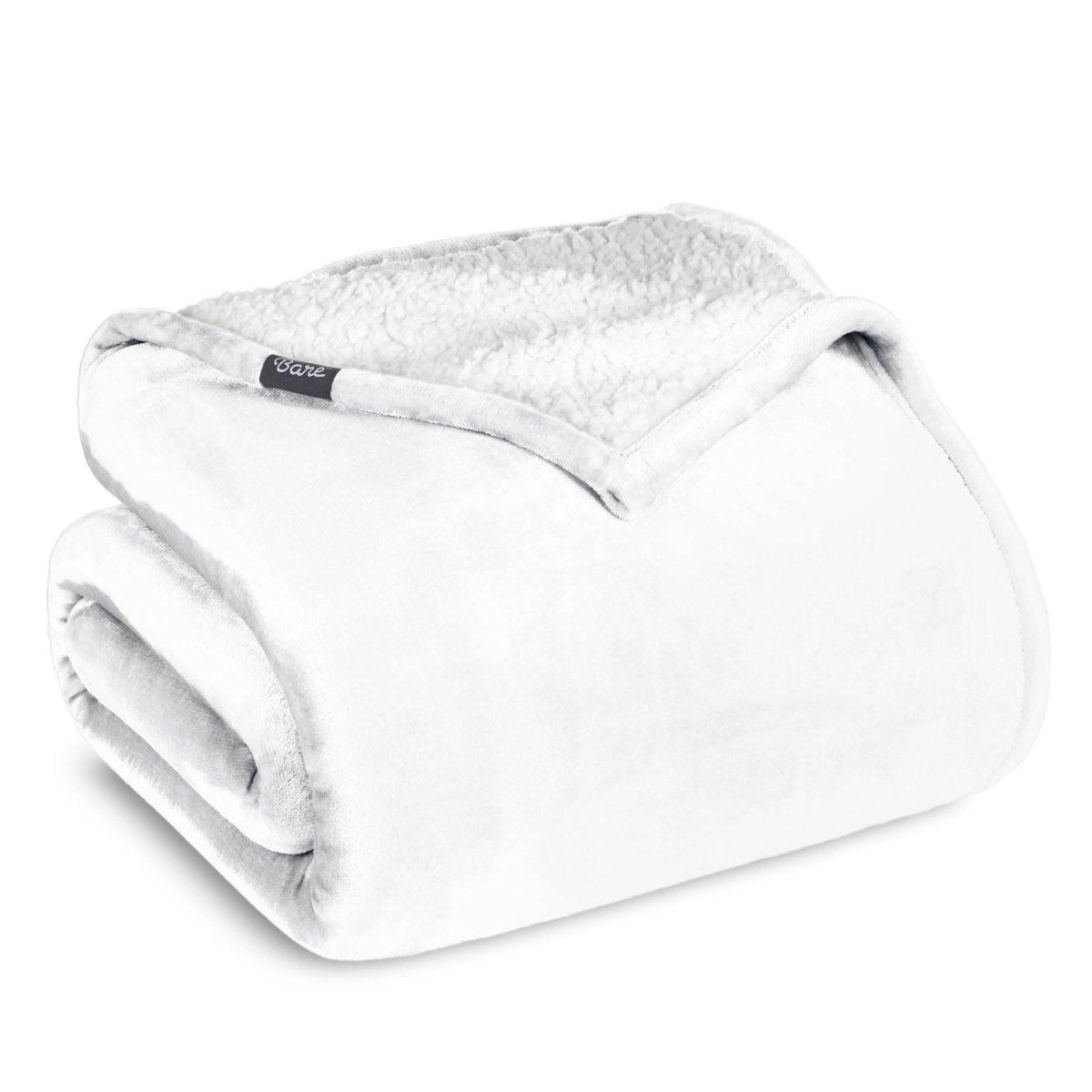 A sherpa blanket folded neatly while showing both sides