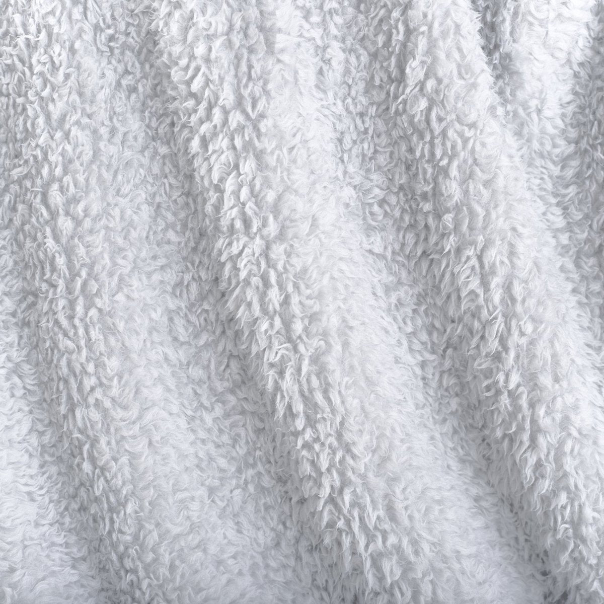Close-up of textured faux shearling blanket