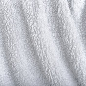 Close-up of textured faux shearling blanket