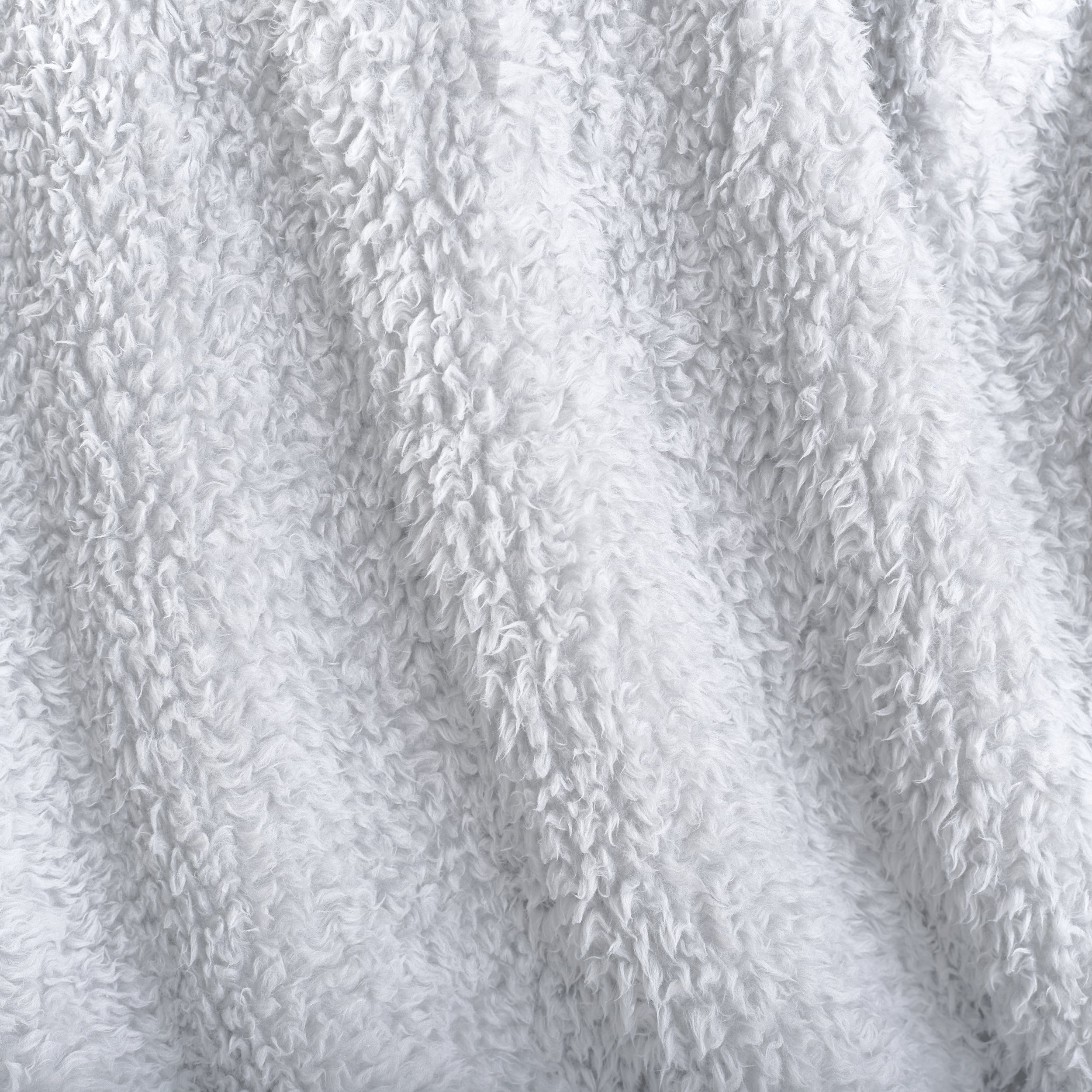 Close-up of textured faux shearling blanket
