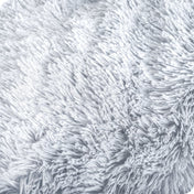 Close up of the soft texture of a shaggy faux fur sherpa blanket