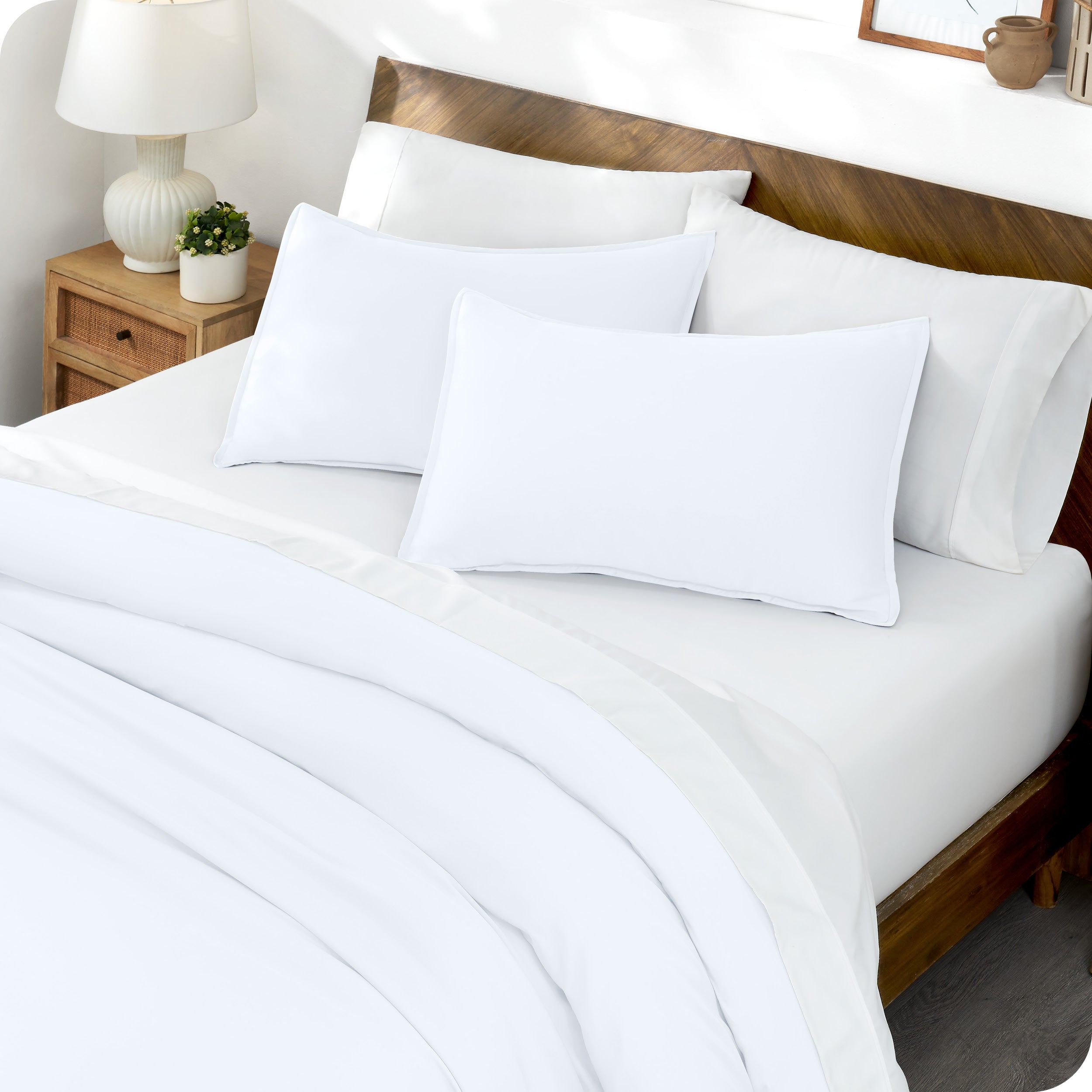 Matching TENCEL™ duvet cover and pillow shams on a bed