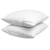 Two pillow protectors on pillows stacked