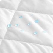 Close up of water drops on a mattress pad