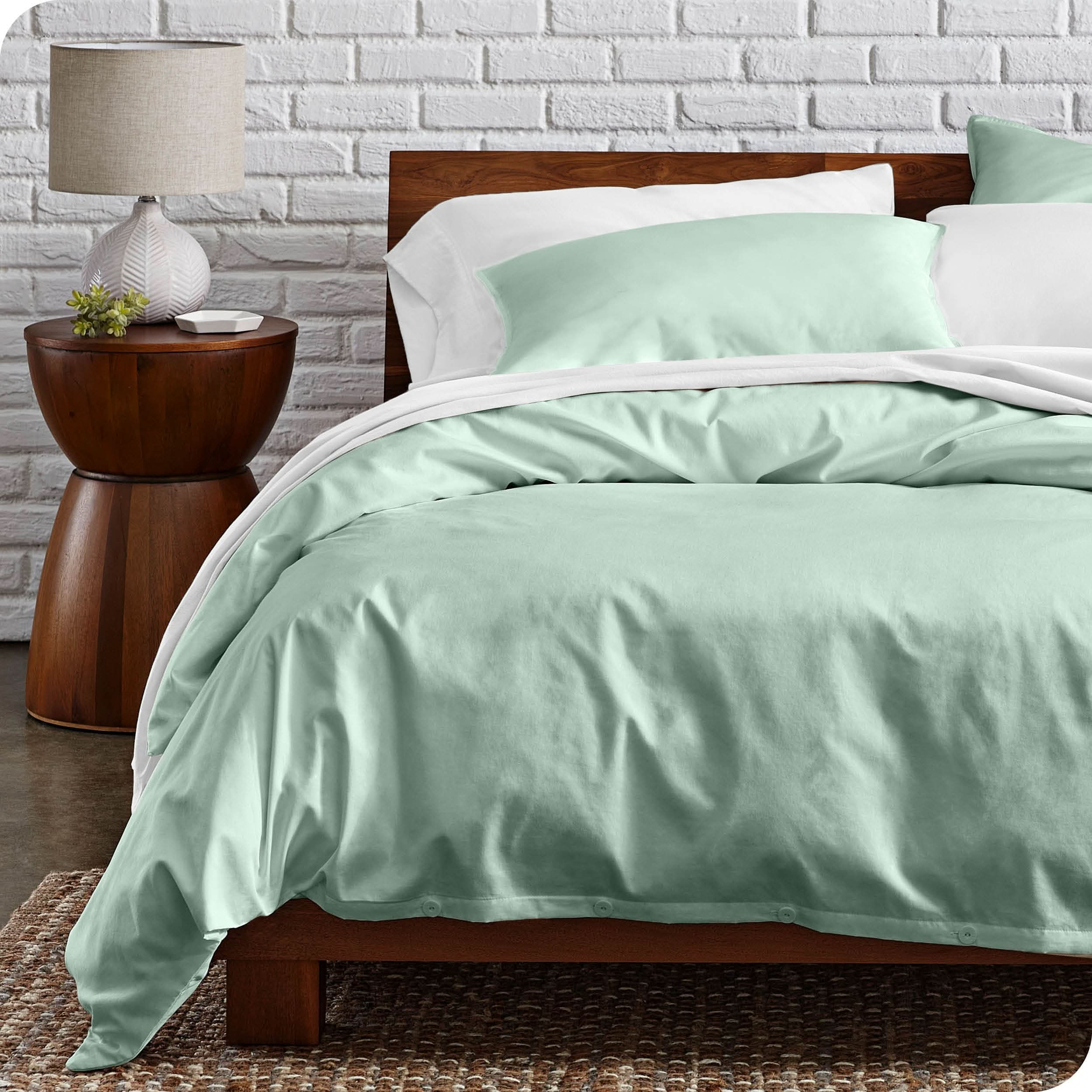 Percale duvet cover set on a bed in a modern bedroom