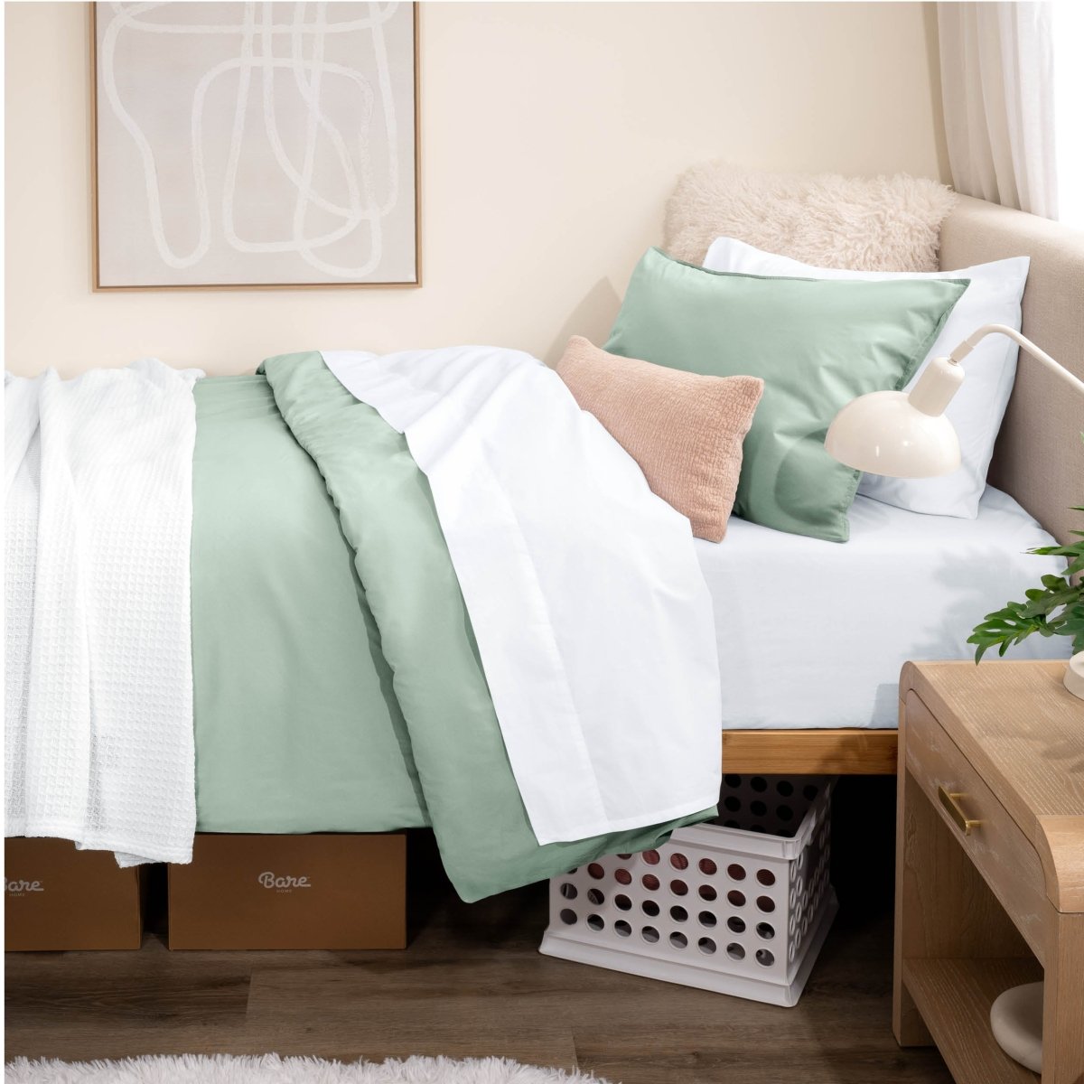 Bed with percale bedding in a dorm room setting