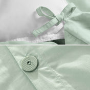Corner ties and button on a duvet cover