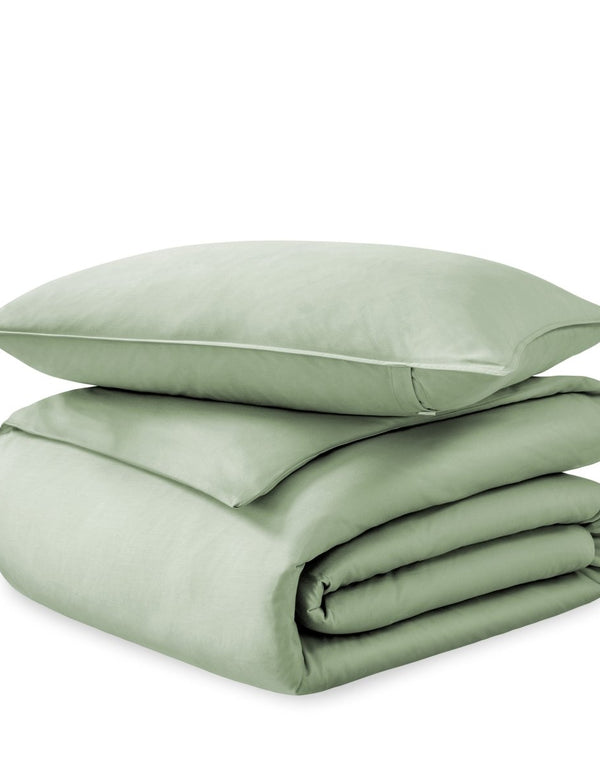 A sateen duvet set arranged in a stack