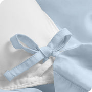 Close up of ties on a percale duvet cover