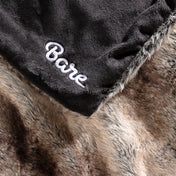 Faux fur blanket with Bare logo