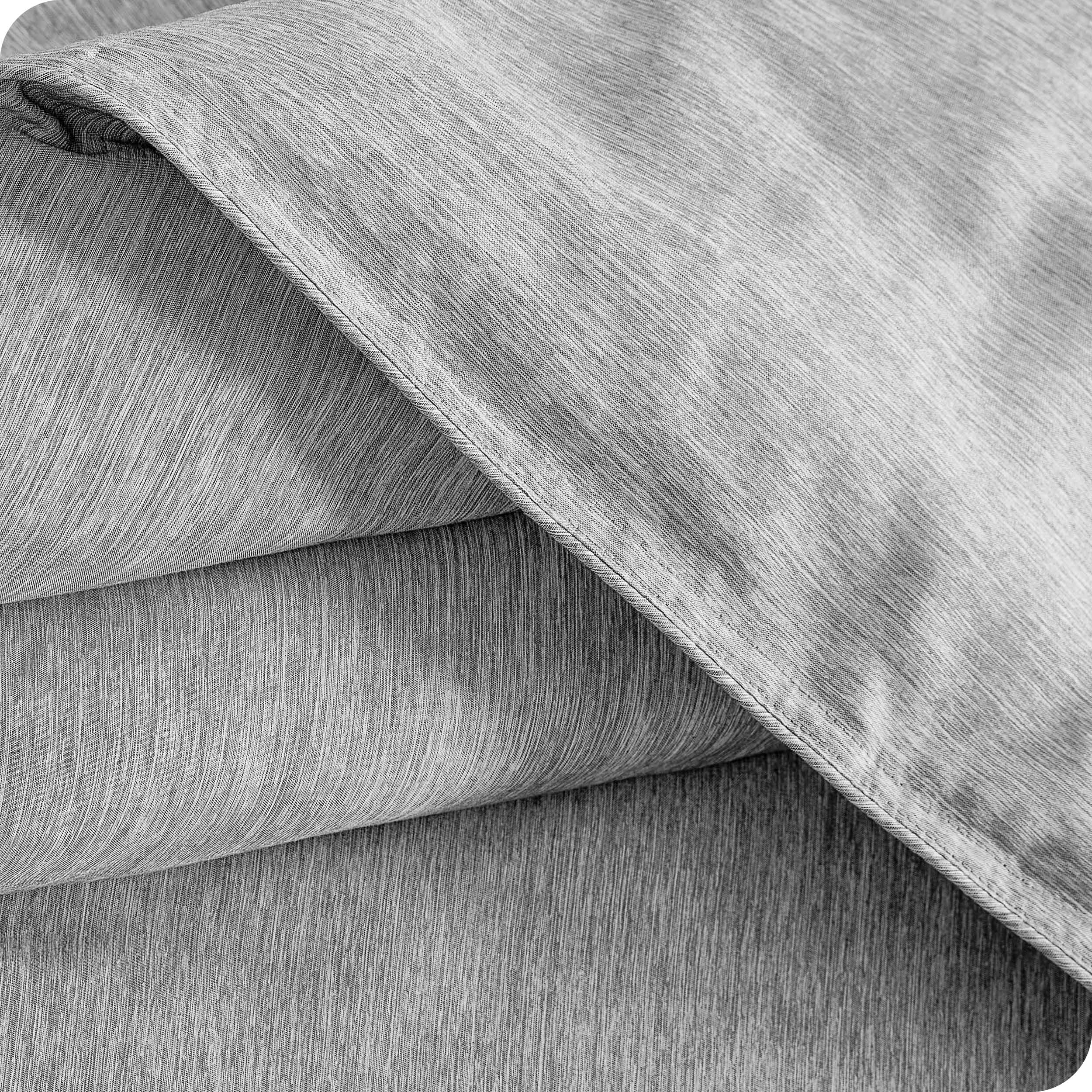Close up of a microfiber comforter folded over itself