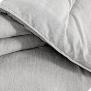 Close up of a microfiber comforter folded over itself