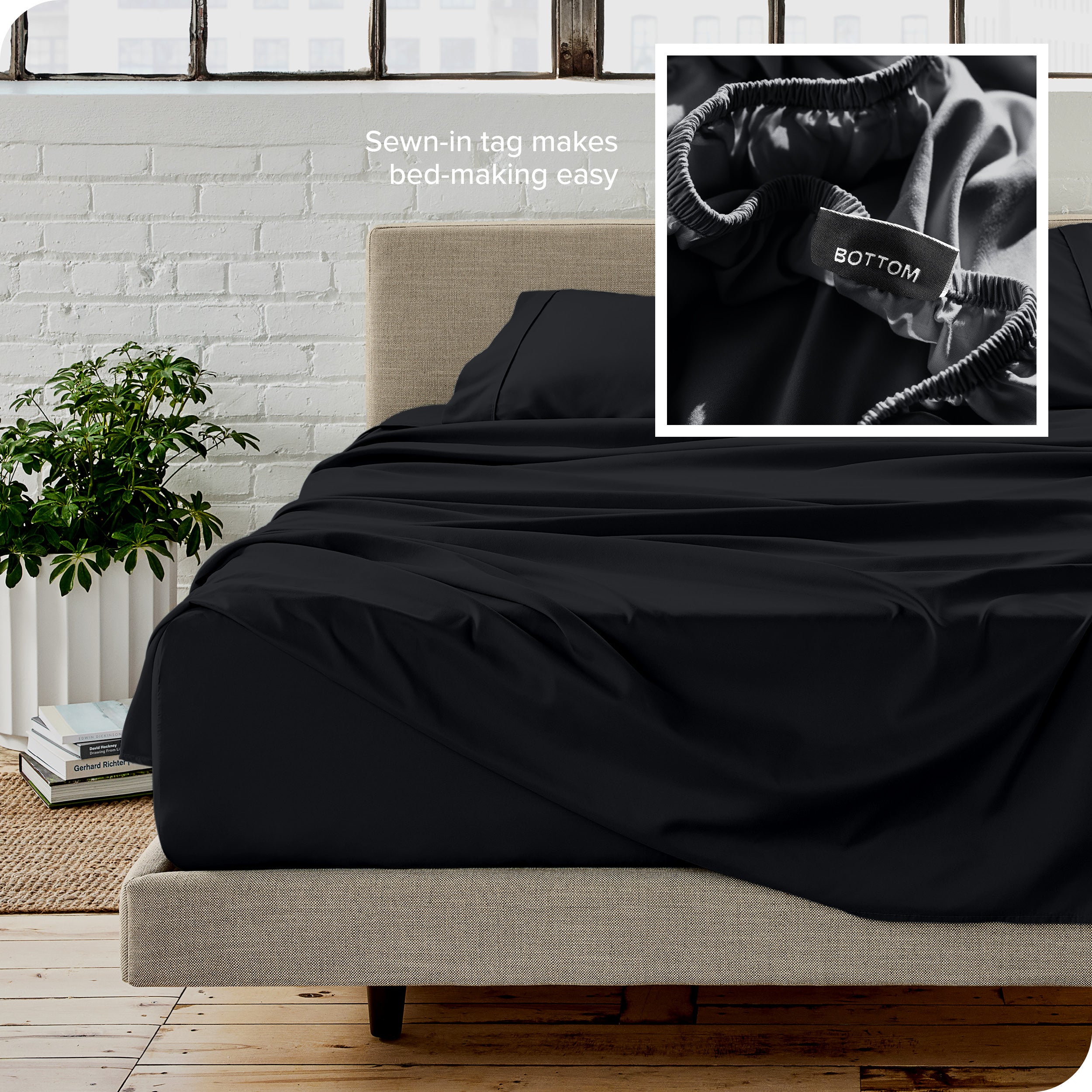 Close up of sewn in tag and matching sheets on a bed