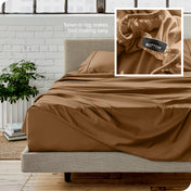 Close up of sewn in tag and matching sheets on a bed