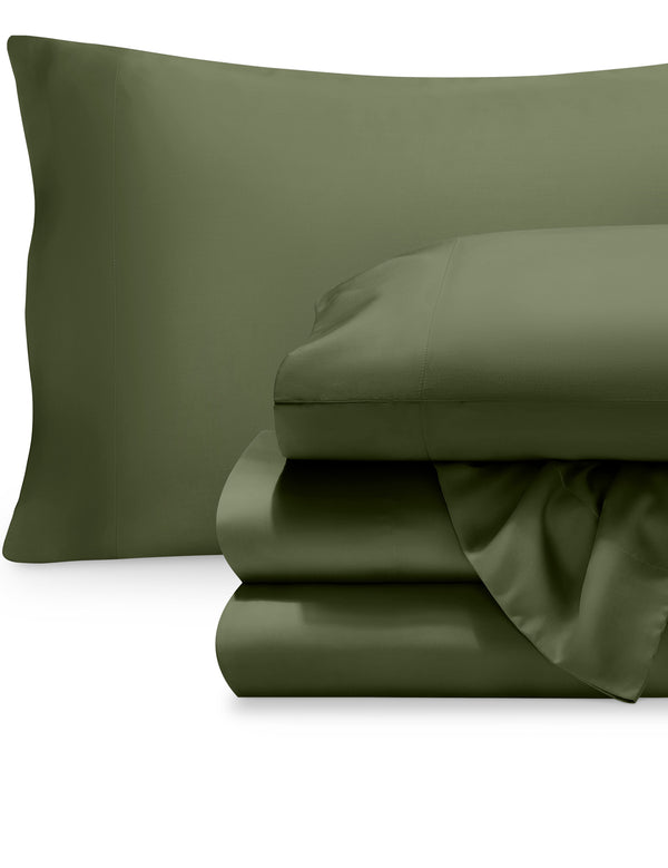Tencel sheet set folded with the pillowcases on pillows