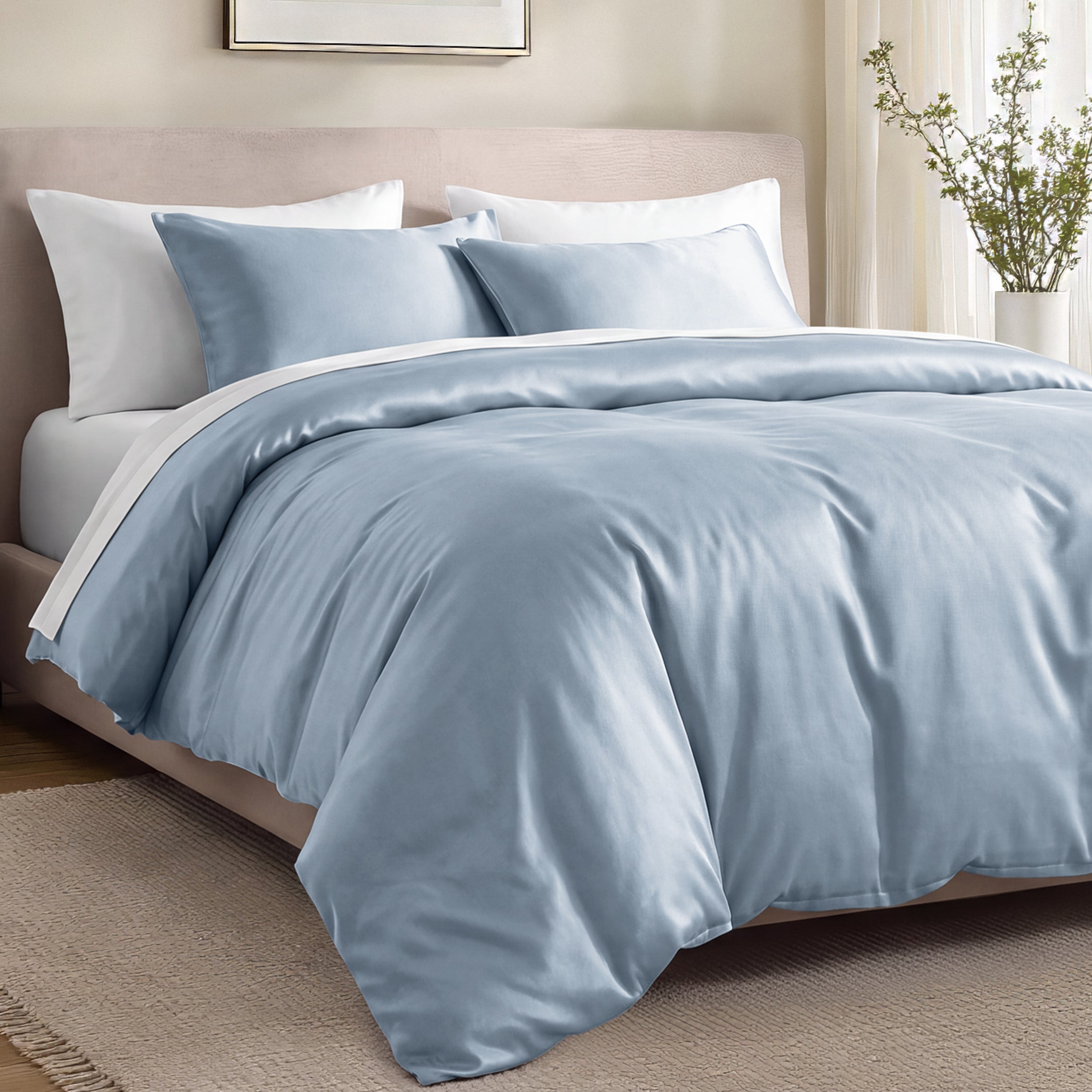 Bed with organic cotton sateen bedding in a bedroom setting.