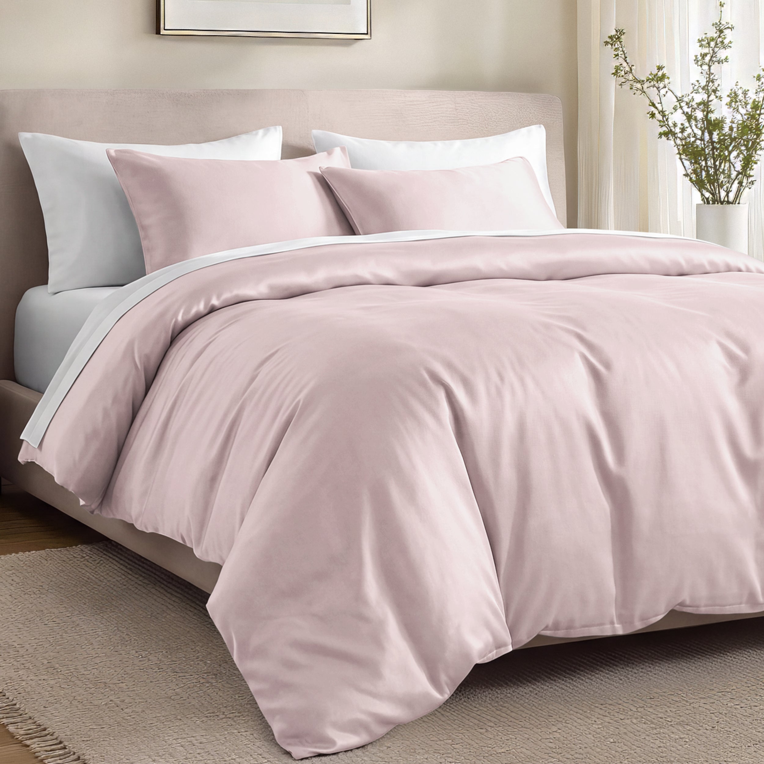 Bed with organic cotton sateen bedding in a bedroom setting.