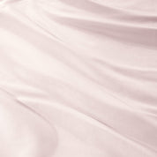Close-up of sateen fabric with visible texture